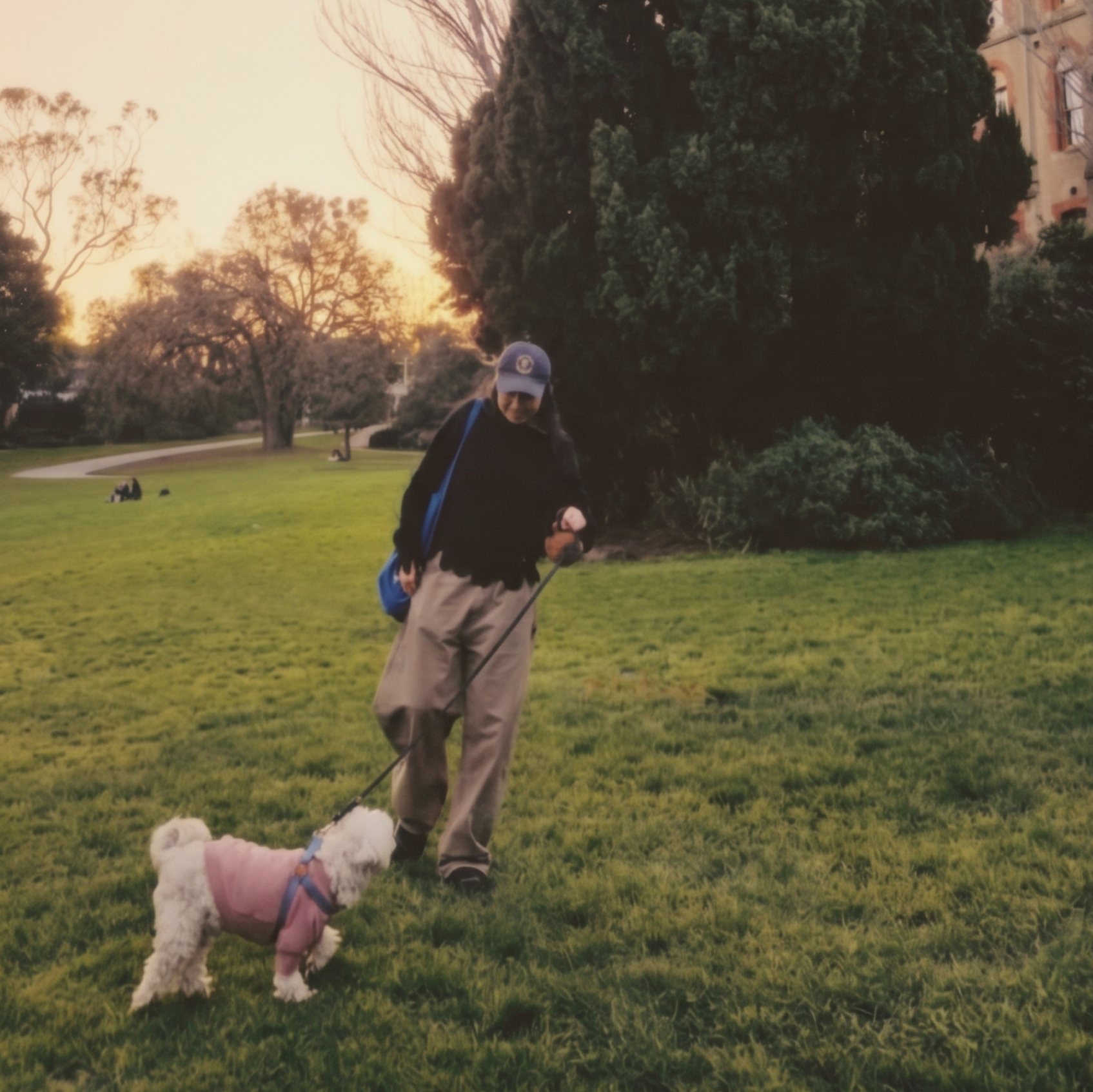 MOON MOON SUN maker Yuha O with her dog DooBoo in a Melbourne park